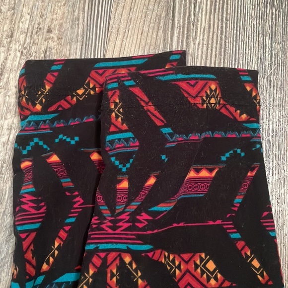 LuLaRoe leggings black base with muted colored print - Picture 3 of 4